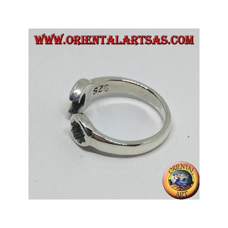 Silver ring in the shape of a ring key and fork combined with a mechanic