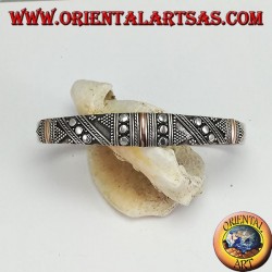 Silver bracelet, with 3 plates in 14 carat gold and handmade studs