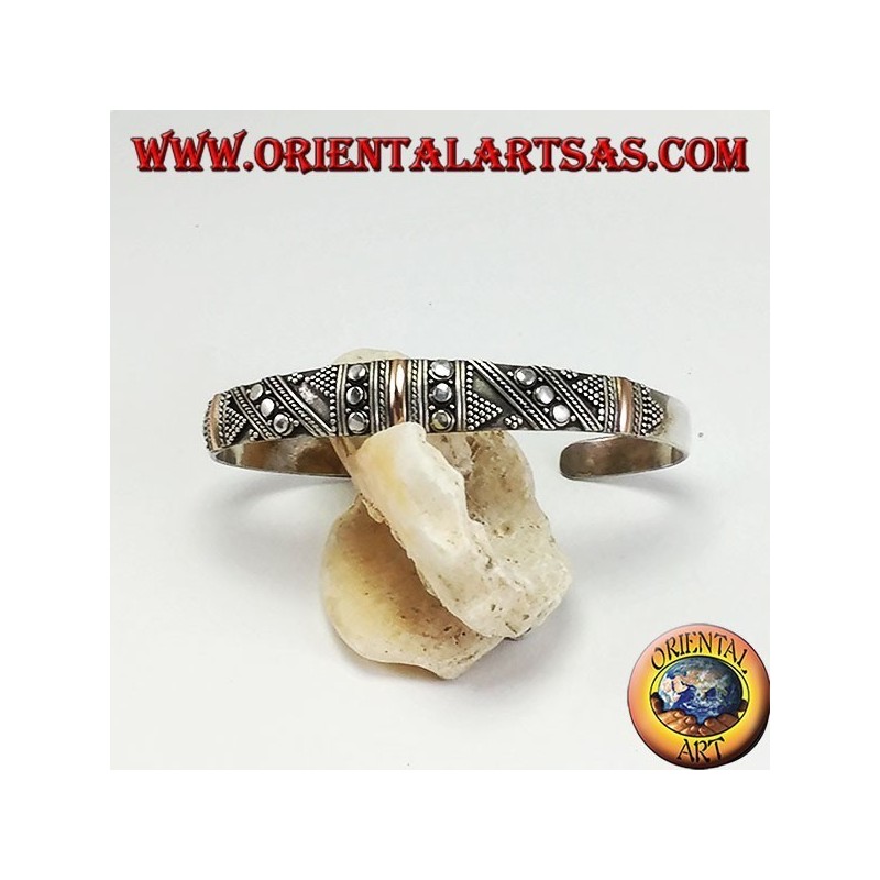 Silver bracelet, with 3 plates in 14 carat gold and handmade studs