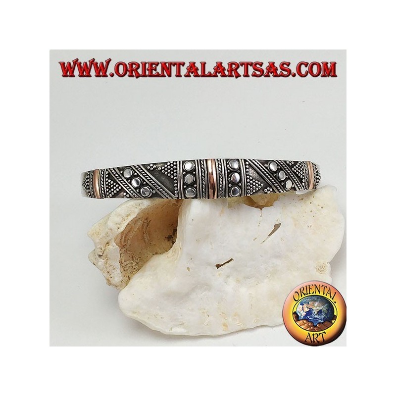 Silver bracelet, with 3 plates in 14 carat gold and handmade studs
