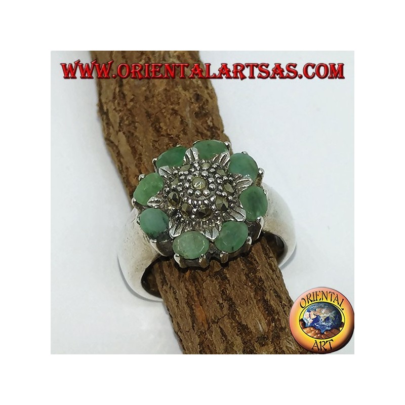 Silver ring with central flower and marcasites surrounded by 8 natural emeralds