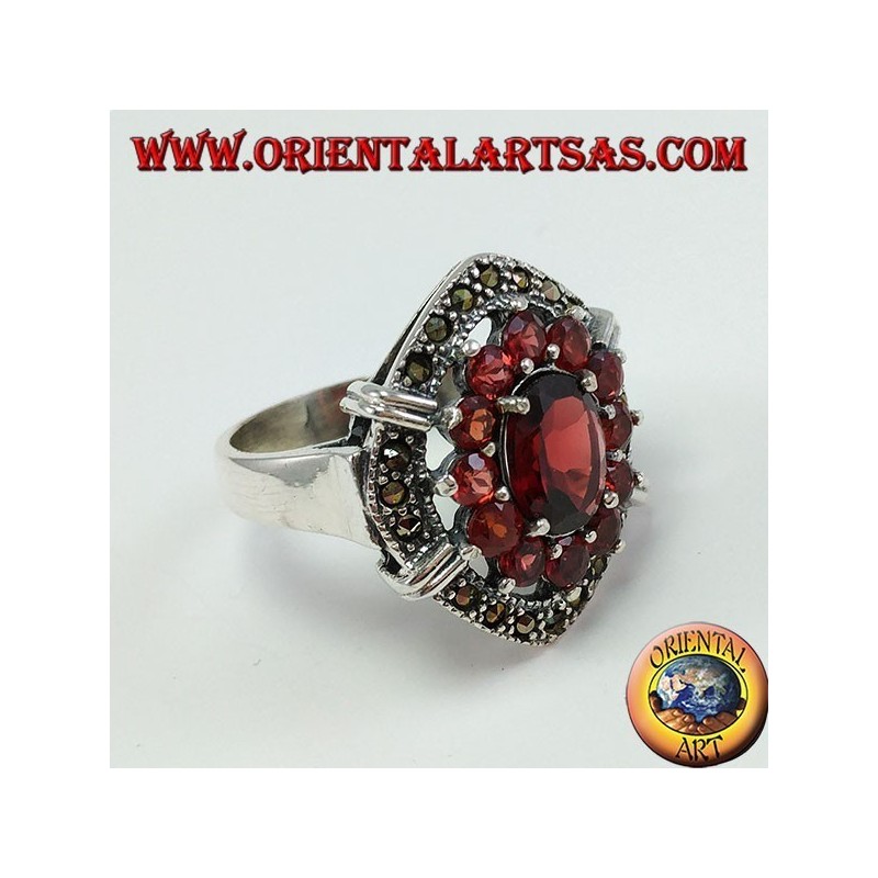 Bague en argent sertie de grenats naturels, 1 ovale et 12 tours
