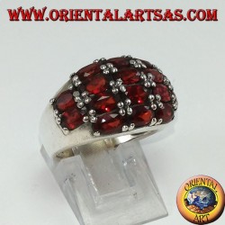 Silver ring with a rounded band with 16 oval natural garnets