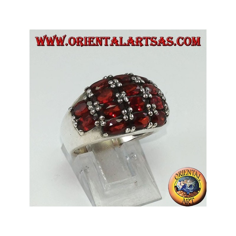 Silver ring with a rounded band with 16 oval natural garnets