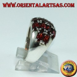 Silver ring with a rounded band with 16 oval natural garnets