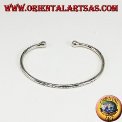 Pulsera rígida en plata, redonda grabada con ondas grabadas a mano.