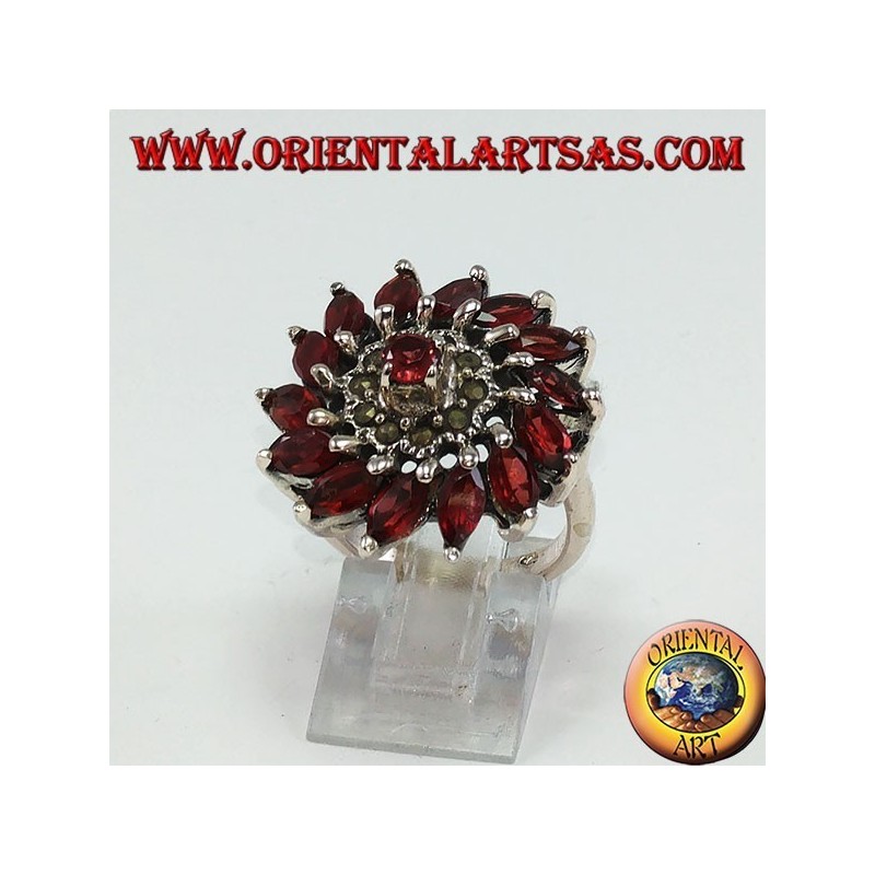 Round pinwheel ring in silver with 14 natural garnet beads