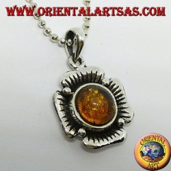 Silver pendant in the shape of a flower with a central hemispherical amber