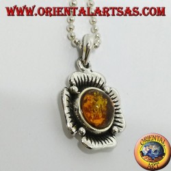 Silver pendant in the shape of a flower with a central hemispherical amber