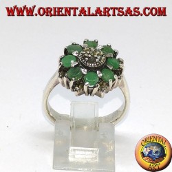 Silver ring in flower with 8 natural round emeralds surrounded by marcasites