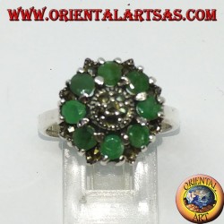 Silver ring in flower with 8 natural round emeralds surrounded by marcasites