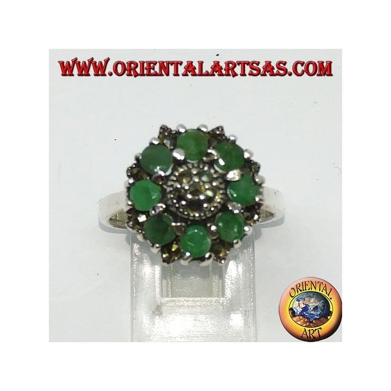 Silver ring in flower with 8 natural round emeralds surrounded by marcasites