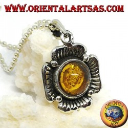 Silver pendant in the shape of a flower with a central hemispherical amber