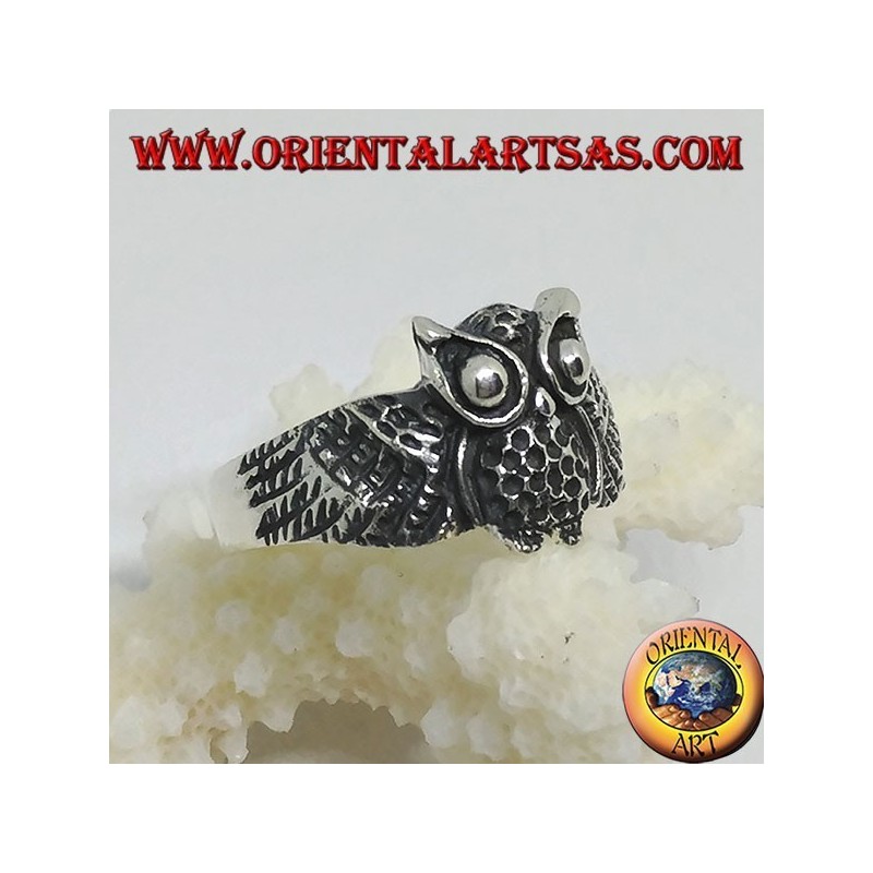 Silver ring in the shape of an owl owl