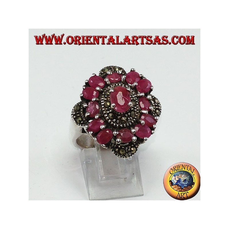 Silver ring with 13 oval rubies set and adorned with marcassite
