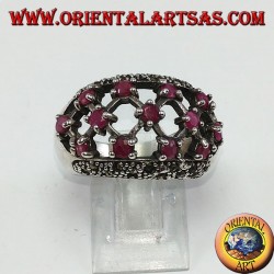 Silver ring with rounded perforated band with 13 round set rubies