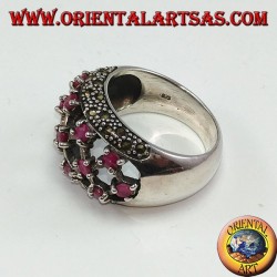 Silver ring with rounded perforated band with 13 round set rubies