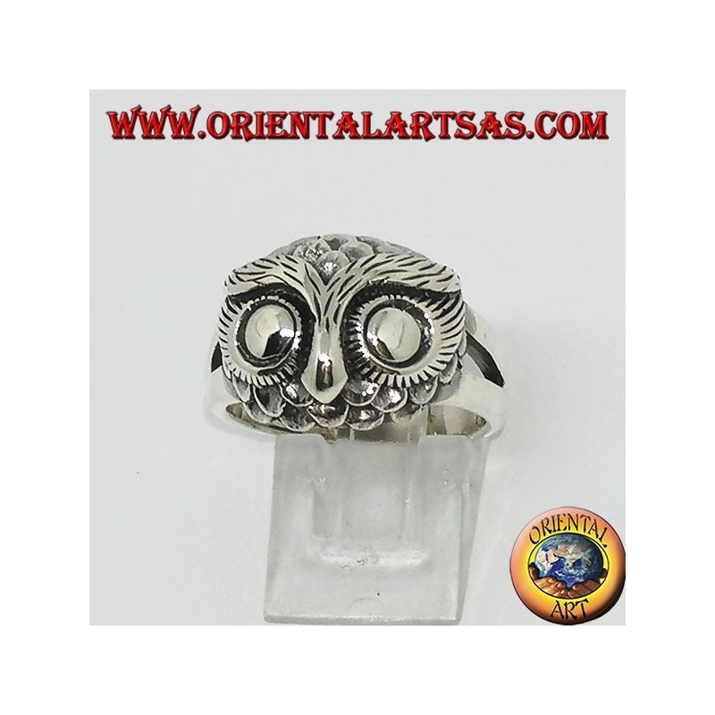 Silver ring with owl's head with big eyes