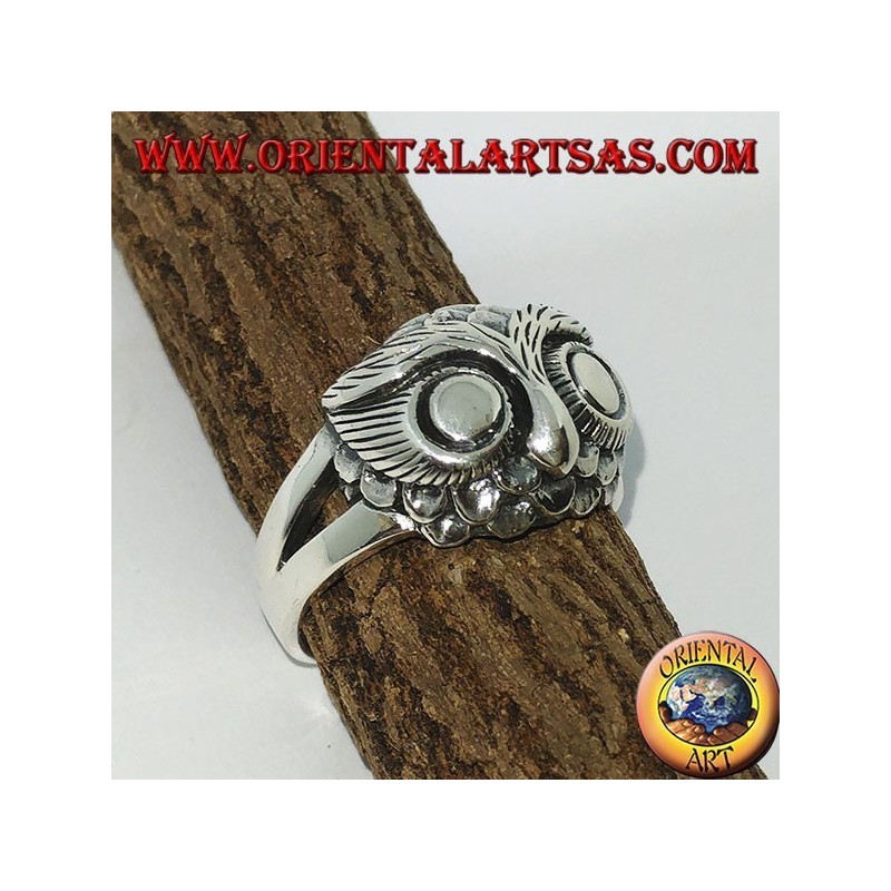 Silver ring with owl's head with big eyes