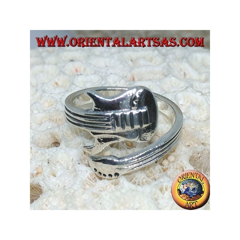 Silver ring wrapping electric guitar, horizontally