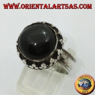 Silver ring on high edge with round Black Star set