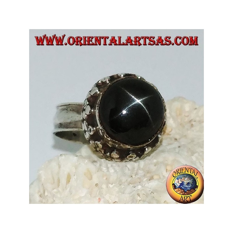 Silver ring on high edge with round Black Star set