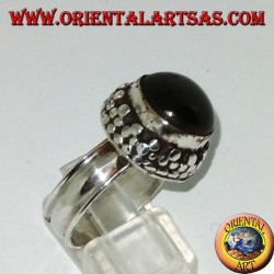 Silver ring on high edge with round Black Star set