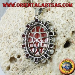 Silver pendant with cameo on mother of pearl surrounded by pearls and garnets