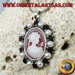 Silver pendant with cameo on mother of pearl surrounded by pearls and garnets