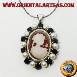 Silver pendant with cameo on mother of pearl surrounded by pearls and garnets