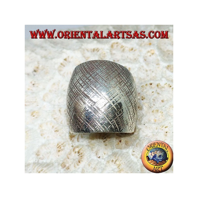 Silver ring with curved band with handmade crossed stripes