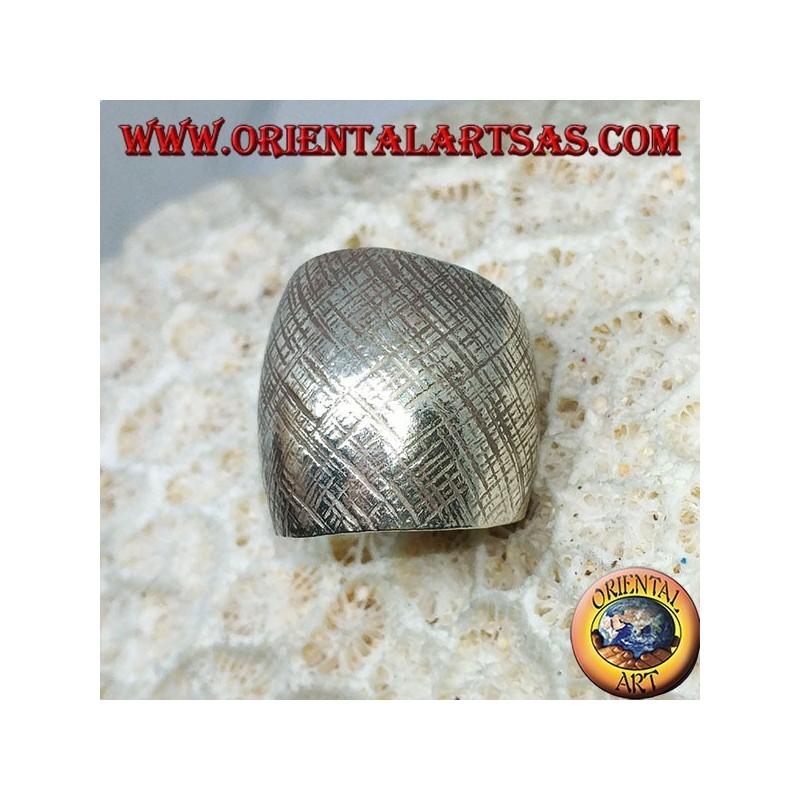 Silver ring with curved band with handmade crossed stripes