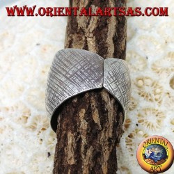 Silver ring with curved band with handmade crossed stripes