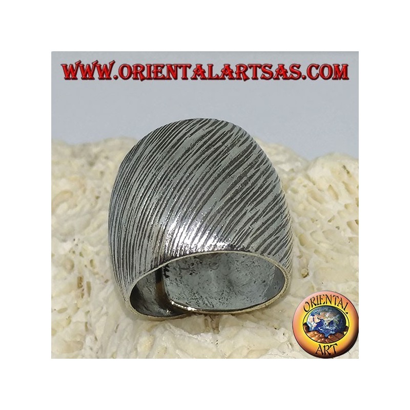 Silver ring with curved band with handmade transversal strip engravings