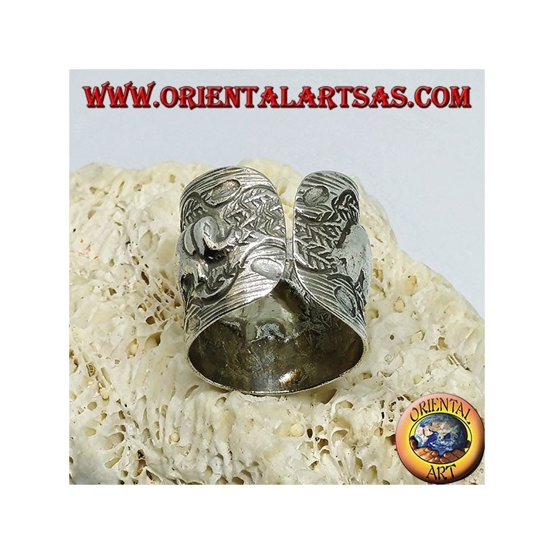 Silver band ring with elephants hand-chiseled by the Karen