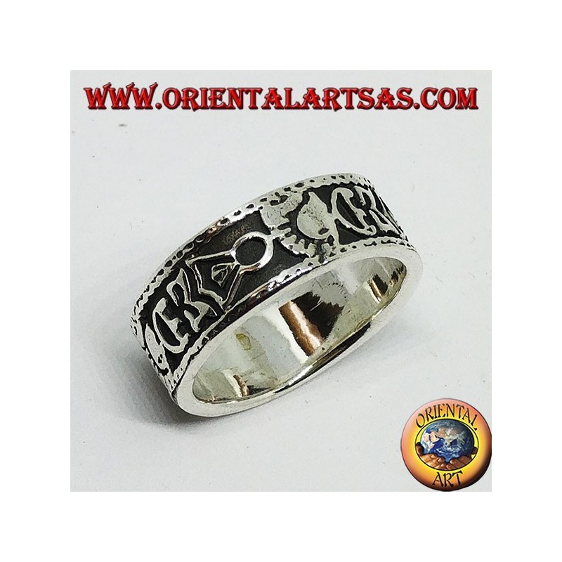 Silver band ring with Maori bas-relief designs