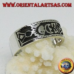 Silver band ring with Maori bas-relief designs