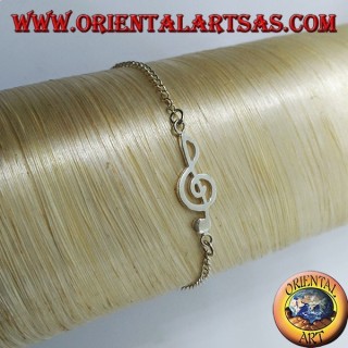 Pulsera de plata suave con una clave de sol en el centro.