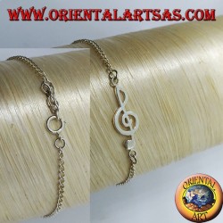 Pulsera de plata suave con una clave de sol en el centro.