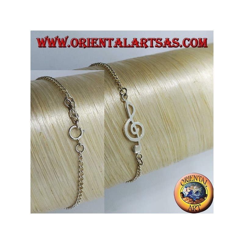 Bracelet en argent doux avec une clé de sol au centre