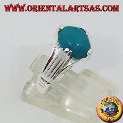Silver ring with oval-shaped turquoise on four points