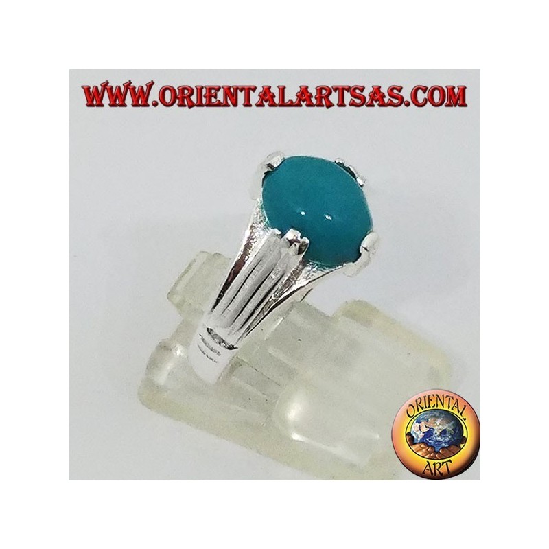 Silver ring with oval-shaped turquoise on four points