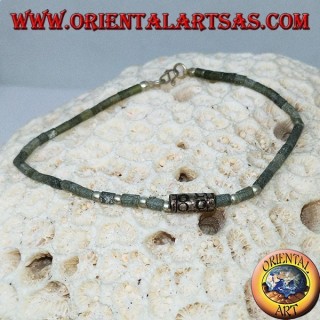 Bracelets with raw jade tubes and strung silver balls