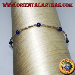 Bracelet with silver balls and strings of blue agate beads