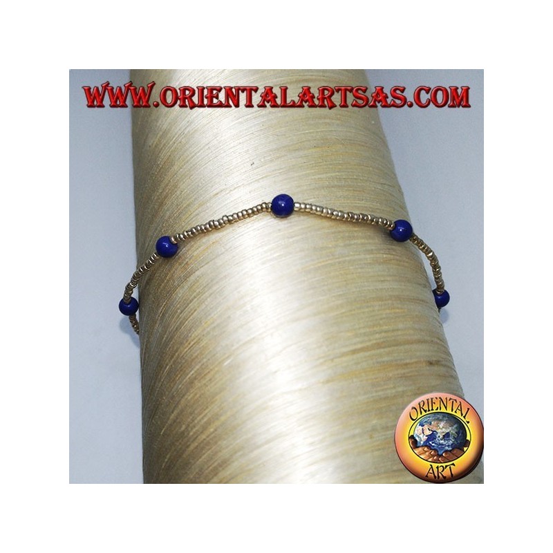 Bracelet with silver balls and strings of blue agate beads
