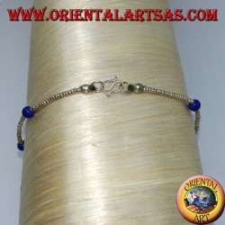 Bracelet with silver balls and strings of blue agate beads