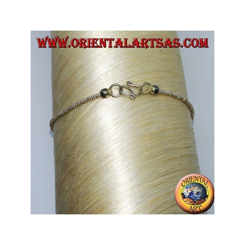 Bracelet strung with silver balls and tumbled amethyst pieces