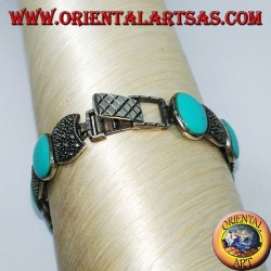 Silberarmbänder, besetzt mit ovalem Türkis und Markasit