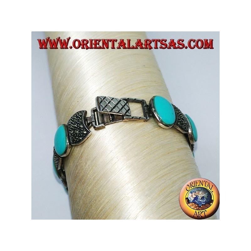 Silberarmbänder, besetzt mit ovalem Türkis und Markasit