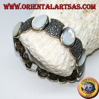 Silver bracelets, set with oval mother-of-pearl and marcasite
